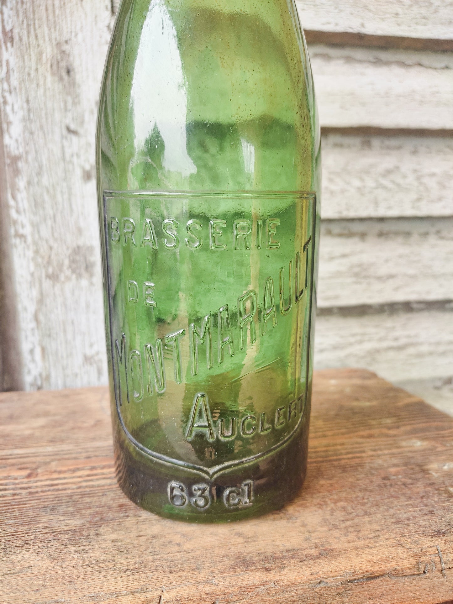 Bouteille de bière en verre.