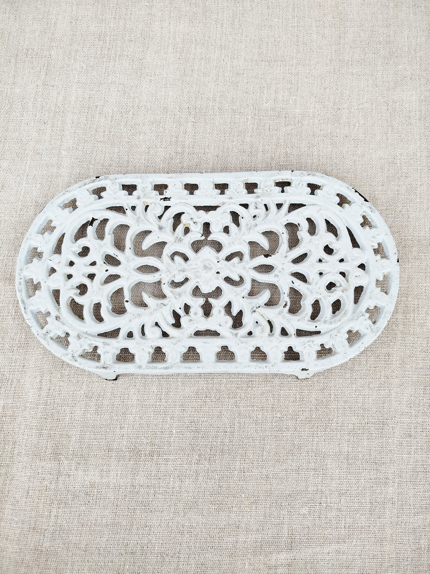 Dessous de plat en fonte