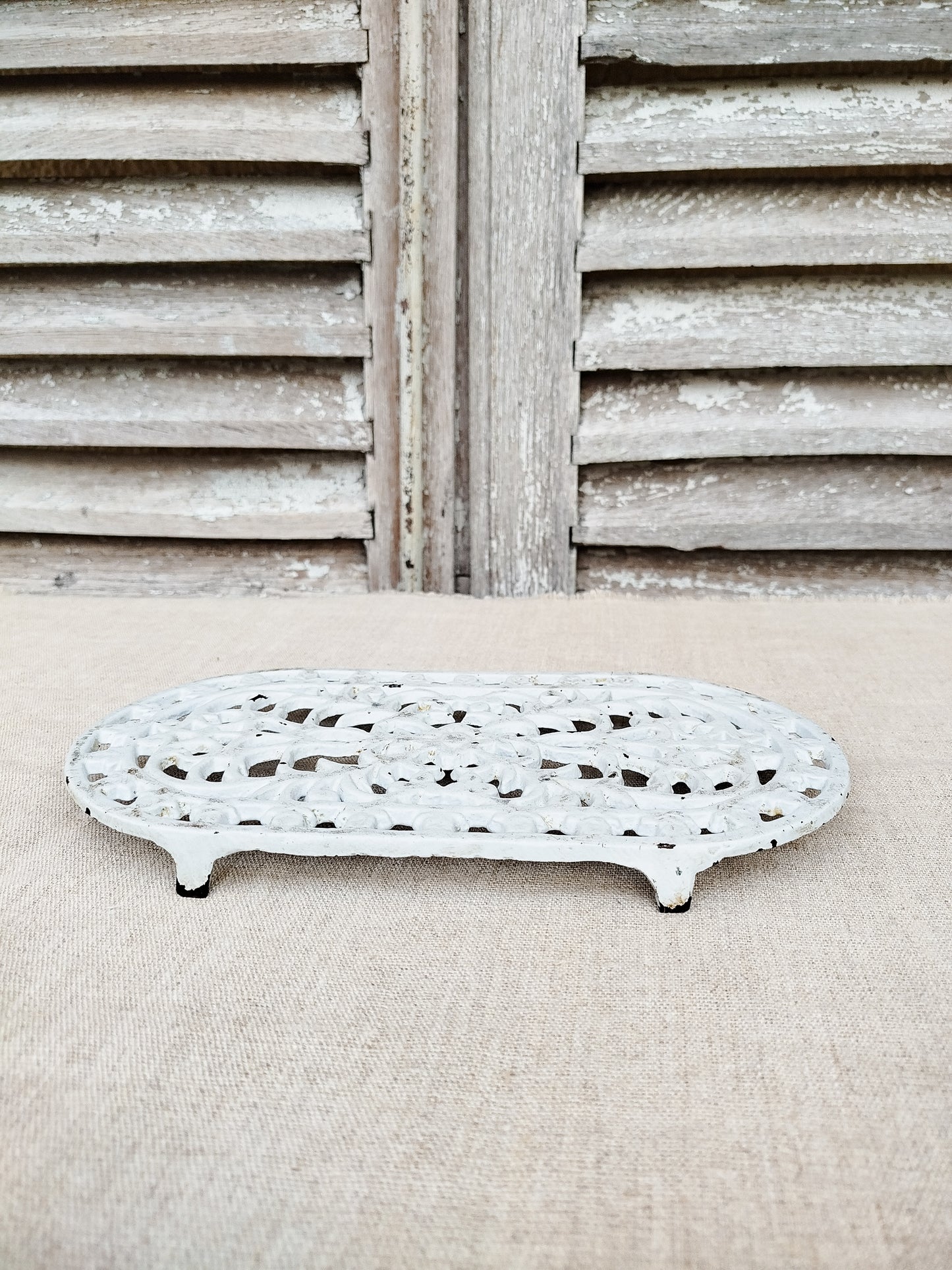 Dessous de plat en fonte