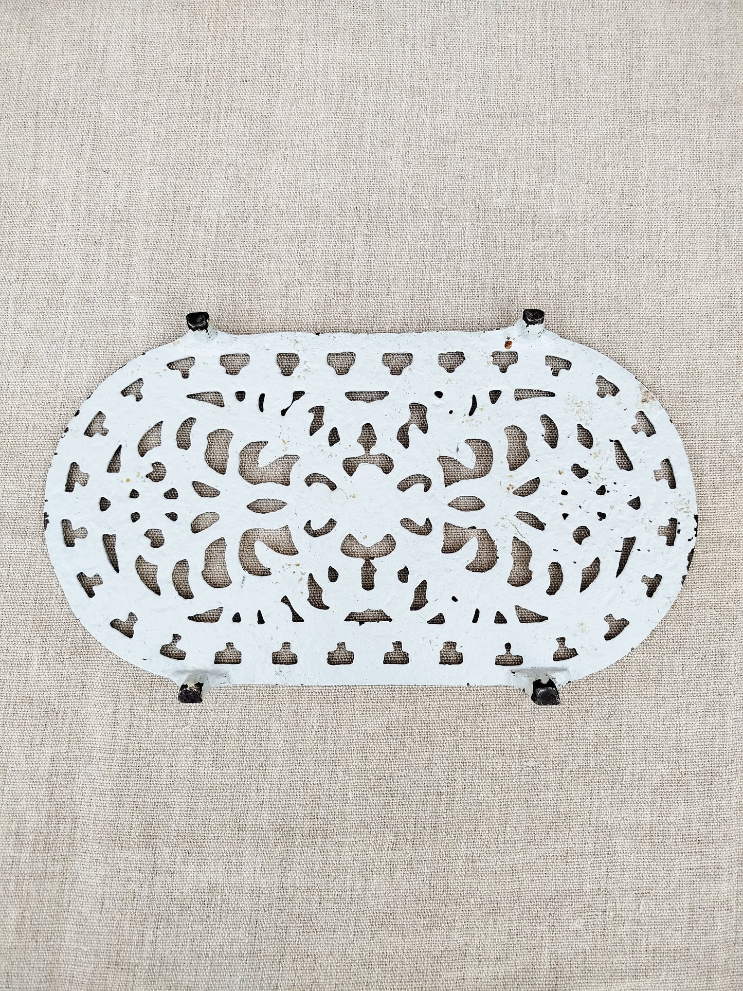 Dessous de plat en fonte