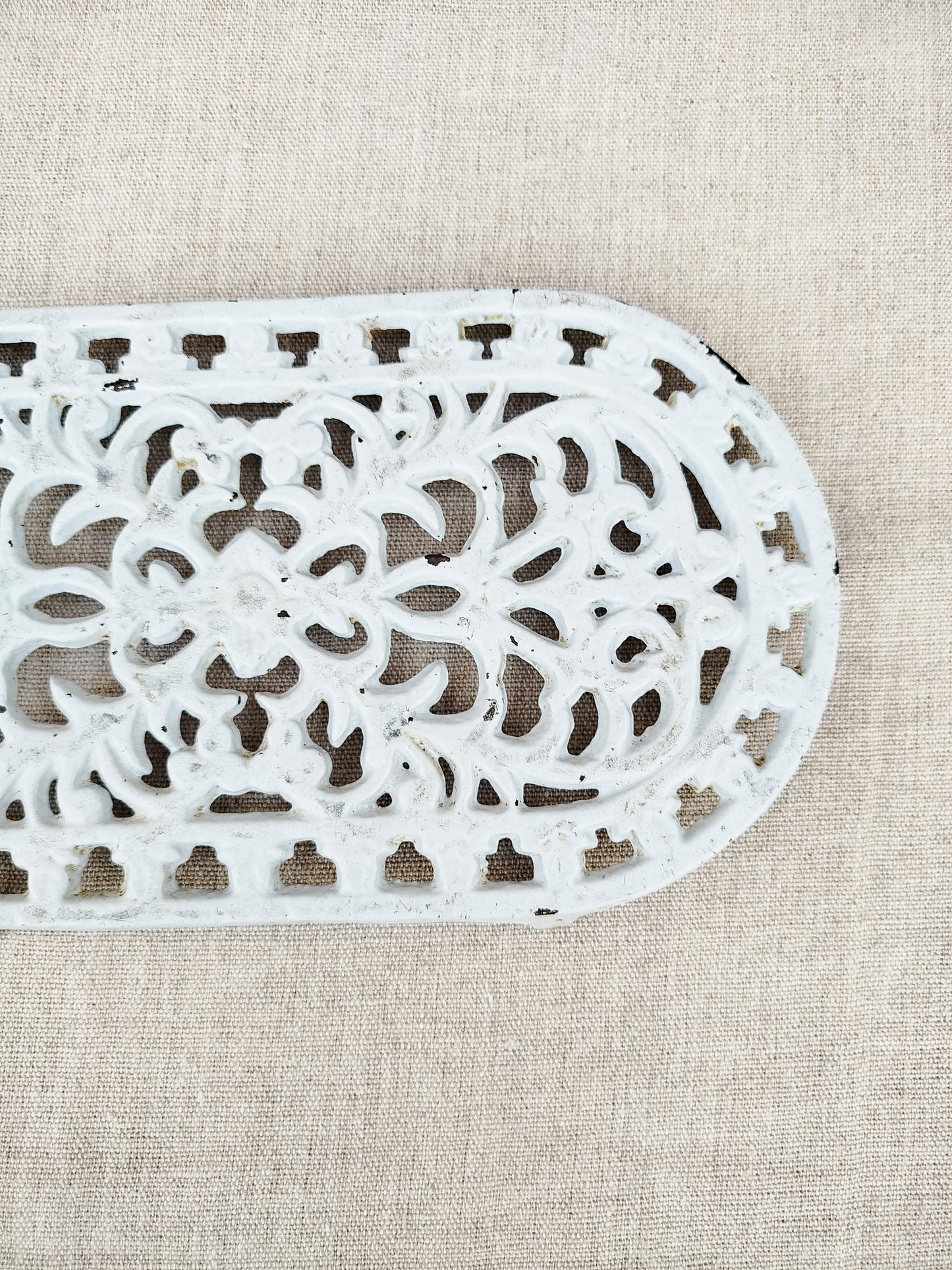Dessous de plat en fonte