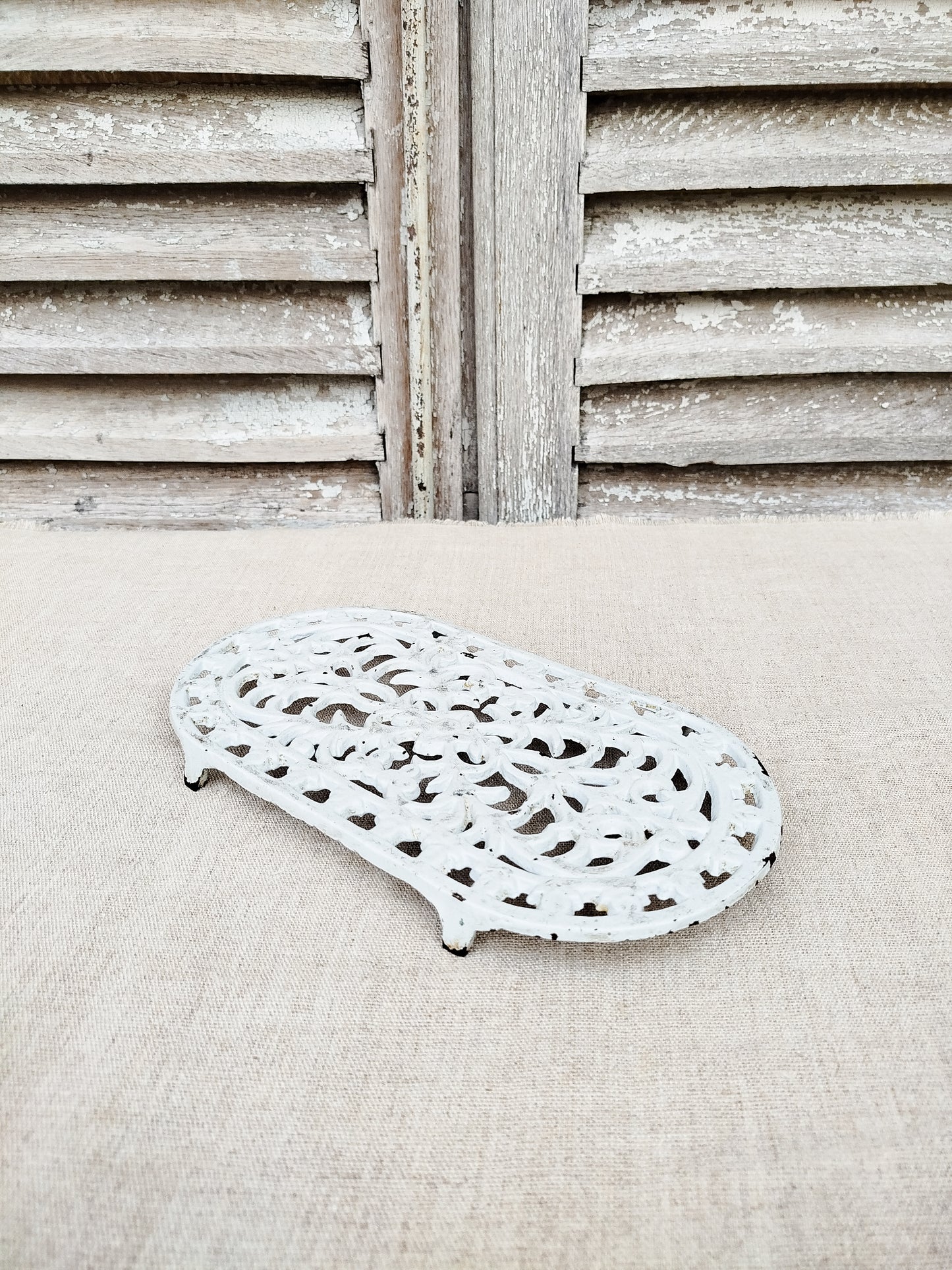 Dessous de plat en fonte