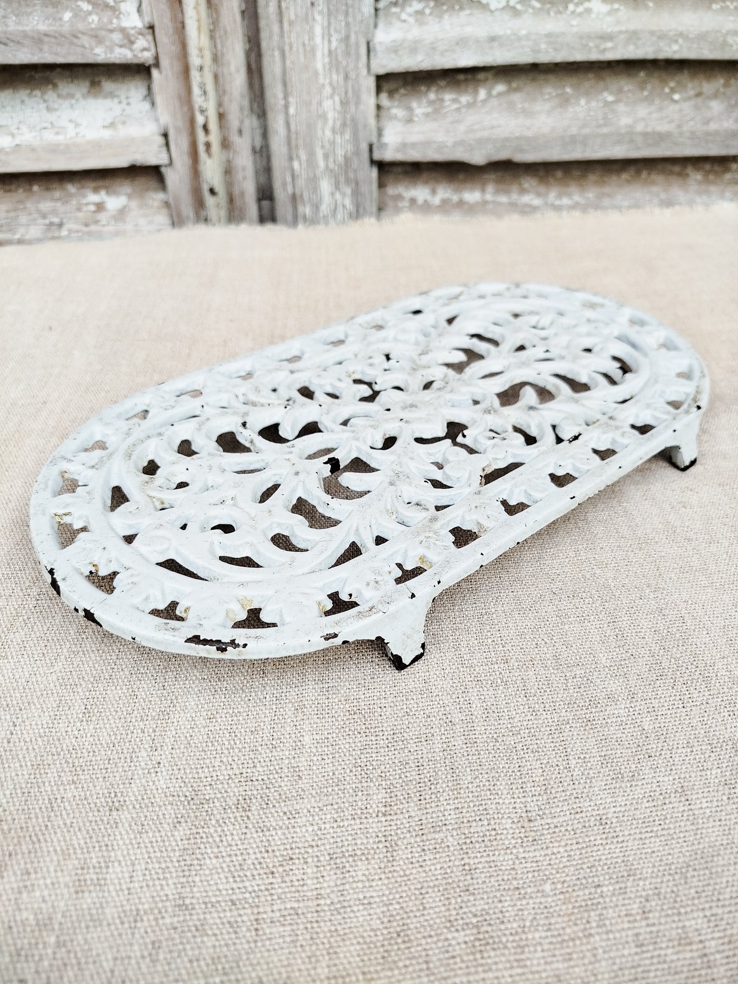 Dessous de plat en fonte