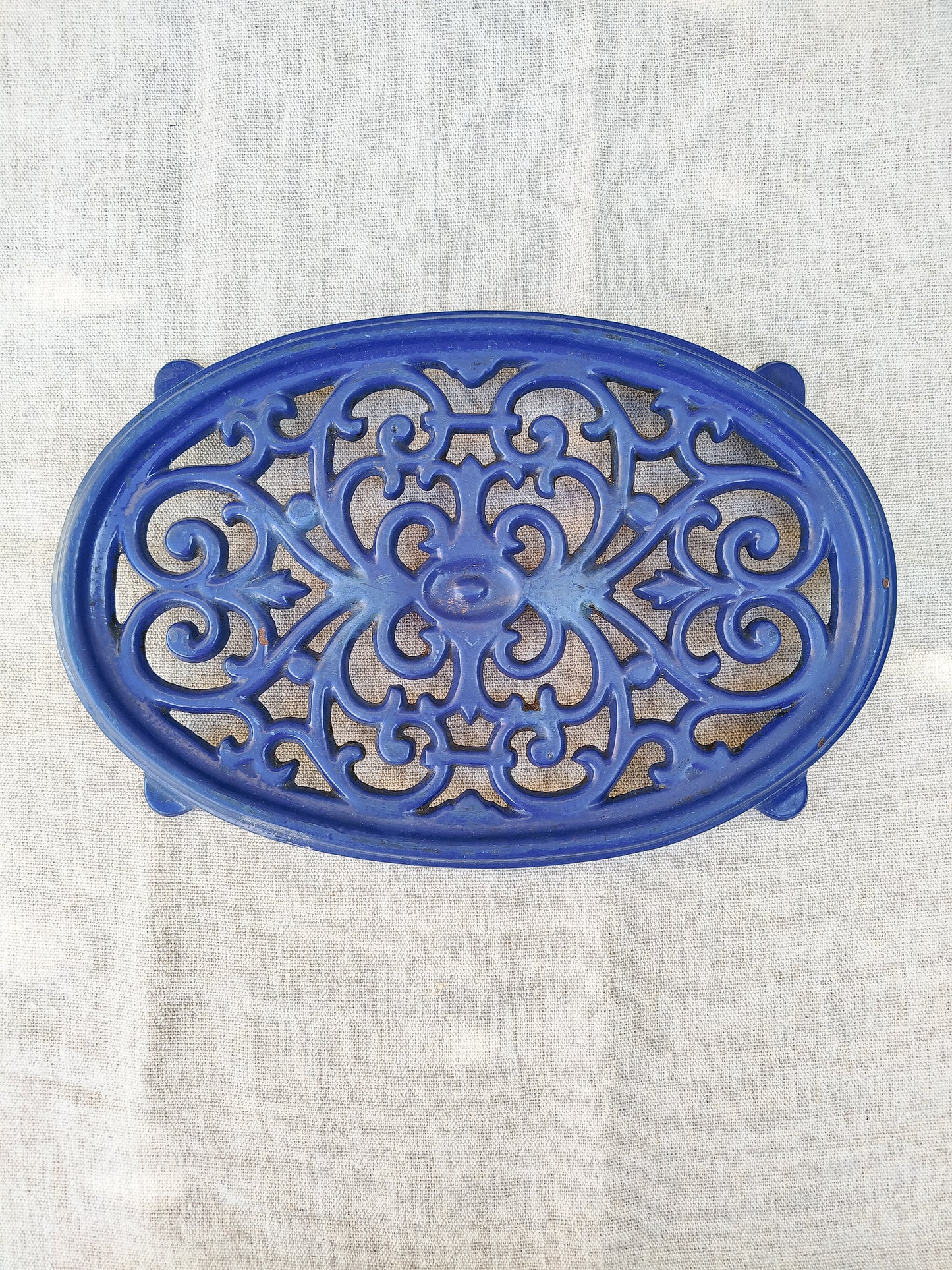 Dessous de plat en fonte