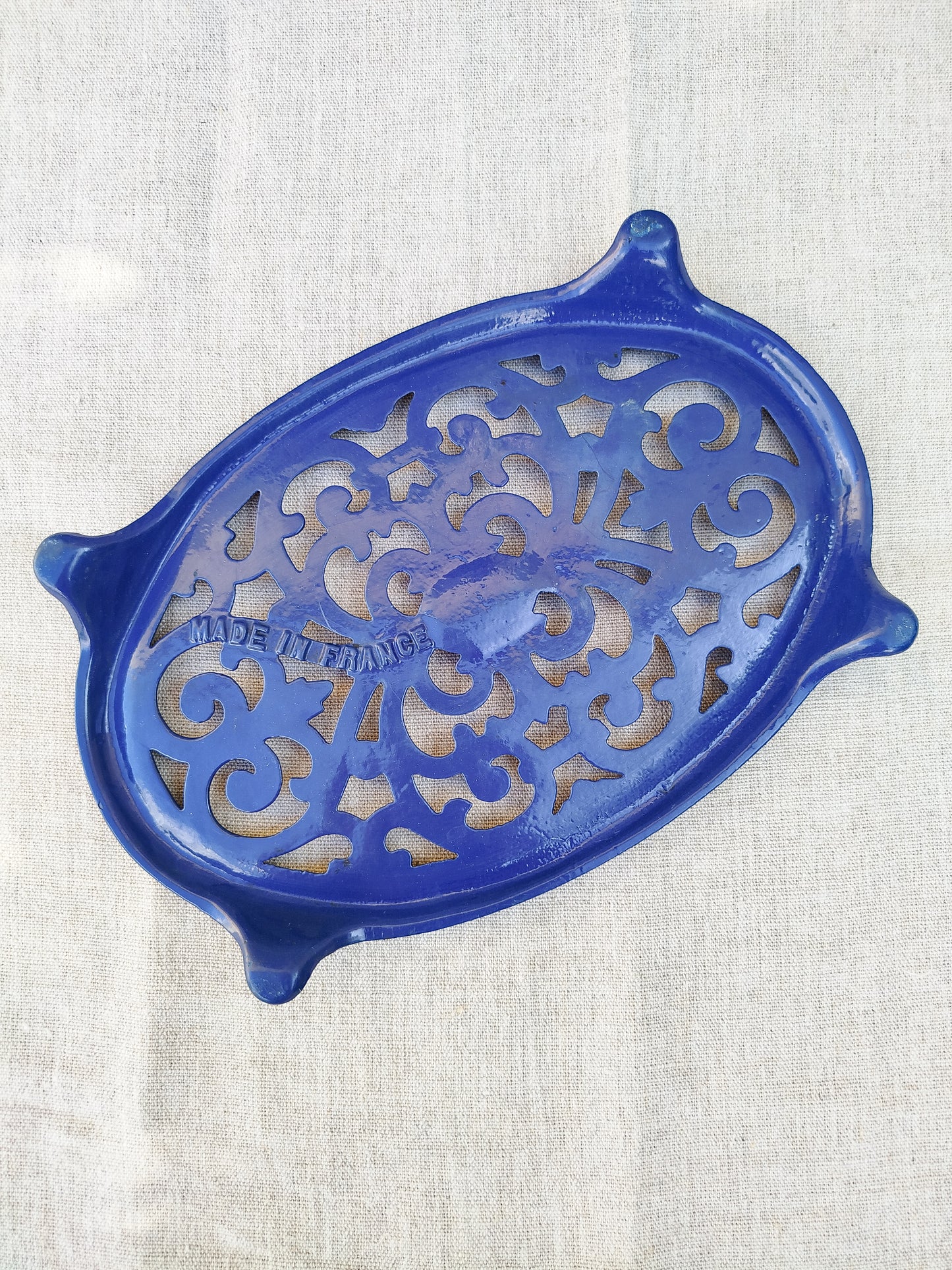 Dessous de plat en fonte